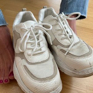 Woman’s Well Worn White and Cream sneakers